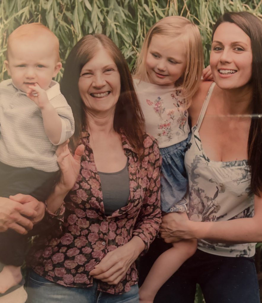 Isobel with the children — the grandmother who stepped in as an anchor for the whole family during the worst months of the crisis