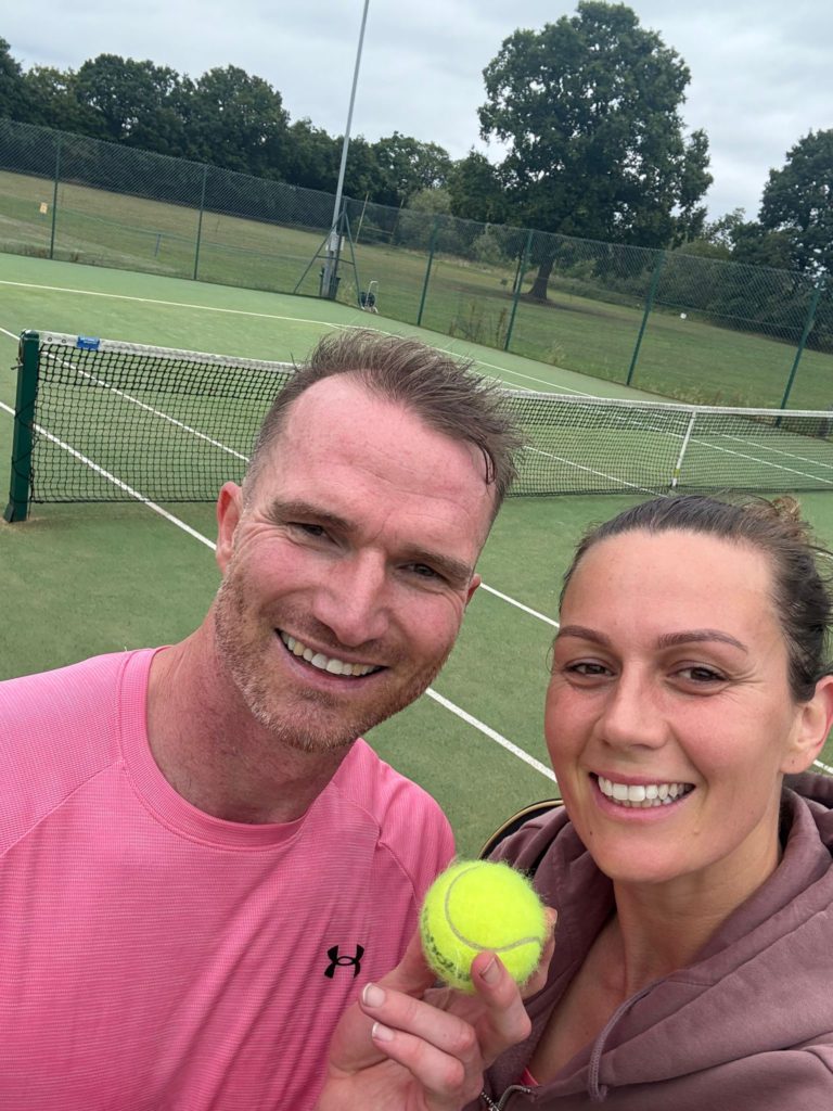 John and Dani playing tennis together for the first time in two years — a moment of genuine joy after the long months of crisis
