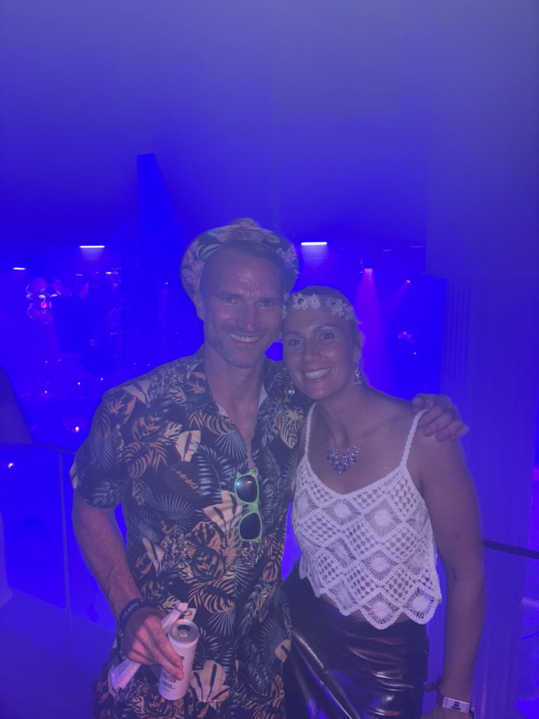 John smiling in Ibiza — a genuine smile, the kind that had been absent for so long